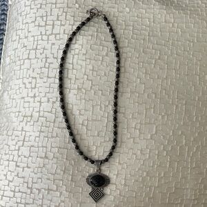 Elegant Black Beaded Necklace with Sterling Geometric Pendant.  heavy piece